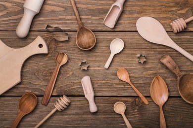 kitchen utensils on a wooden table, top view