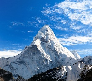 view of ama dablam on the way to everest base camp with beautiful cloudy sky, sagarmatha national park, khumbu valley, nepal