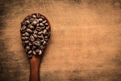 a coffee mug of coffee beans