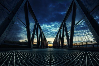 symmetrical bridge at sunset