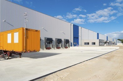 exterior of a newly build warehouse with loading docks
