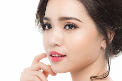 portrait of the bride with big beautiful eyes on white background