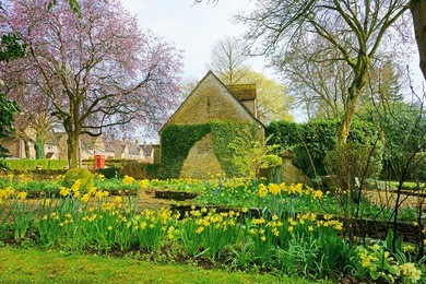 a beautiful spring day in bourton on the water, gloucestershire, united kingdom