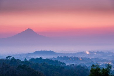 gorgeous sunrise view of mount merapi and borobudur 