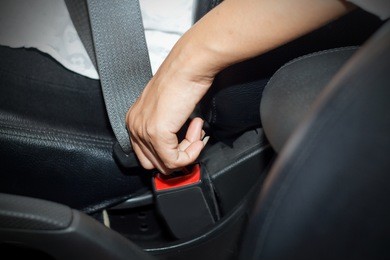 asian women were locked car seat belt 