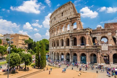 colosseum with clear blue sky, rome, italy. rome landmark and antique architecture. rome colosseum is one of the best known monuments of rome and italy