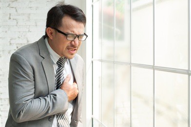 exhausted, tired, illness from overwork concept. businessman be ill and having heart attack or heart failure.