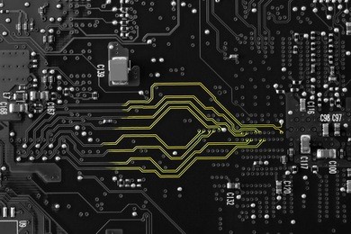 a black and white circuit board with neon yellow showing on the lines to show the communication highway of the circuitry. flat layout, copy space, use as a horizontal or vertical format.