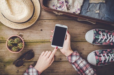 travel preparations on wooden table