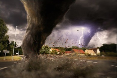 view of a large tornado destroying an entire city