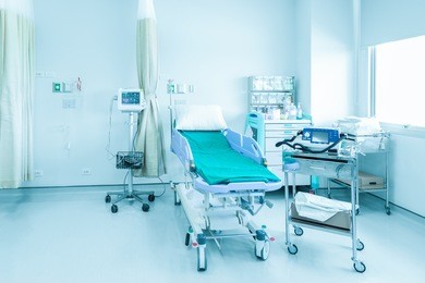 hospital room with beds and comfortable medical equipped in a modern hospital