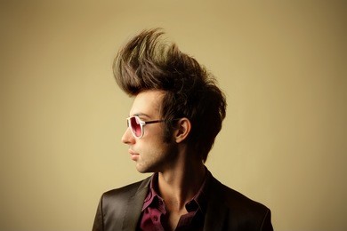 profile of guy with big tuft