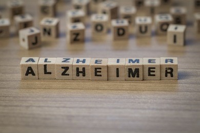 alzheimer (german alzheimer's) written in wooden cubes on a table