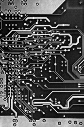 detail of an electronic printed circuit board a black and white color.