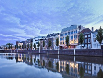stately mansions mirrored in a harbor at twilight, breda, the netherlands