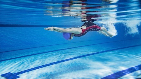 female swimmer swimming pool.underwater picture