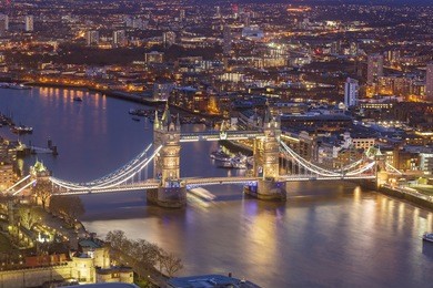 london, england - tower bridge and river thames aerial view at magic hour