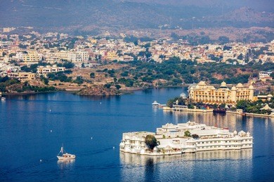 aerial view of lake pichola with lake palace (jag niwas).  udaipur, rajasthan, india