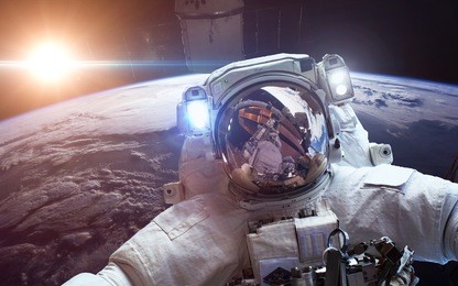 astronaut in outer space against the backdrop of the planet earth. elements of this image furnished by nasa