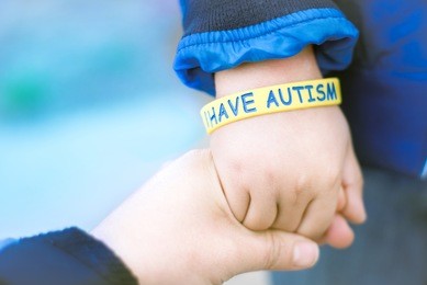 autism awareness picture-i have autism -autism mom holding hand her autistic child 