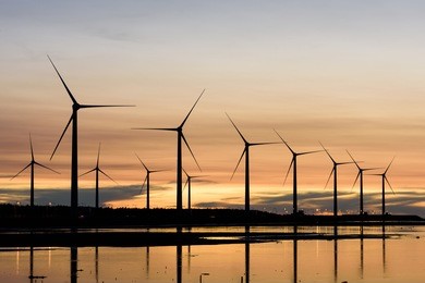 sunset in the windmills and coast in taichung, taiwan
