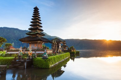 pura ulun danu bratan at sunrise, famous temple on the lake, bedugul, bali, indonesia.