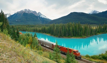 cargo train and lake forest in banff national park in canada