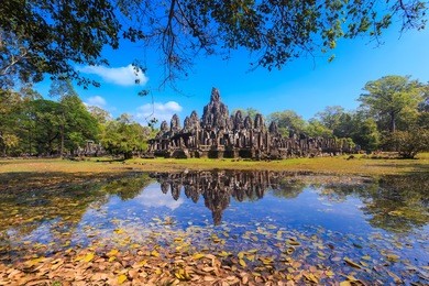 reflection of bayon temple in angkor thom, one of landmark in siem reap, cambodia