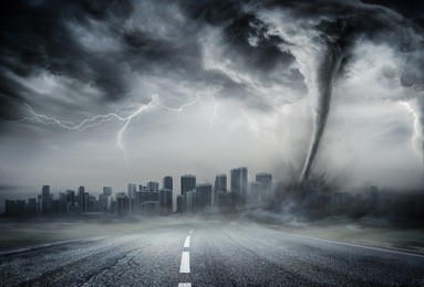 tornado on the business road - dramatic weather on city
