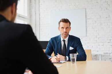 job interview - businessman listen to candidate answers