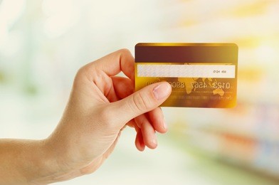 hand holding credit card