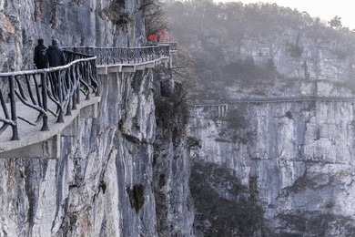 walking path along the cliff of tianmenshan, zhangjiajie, china