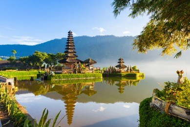 pura ulun danu bratan at sunrise, famous temple on the lake, bedugul, bali, indonesia.