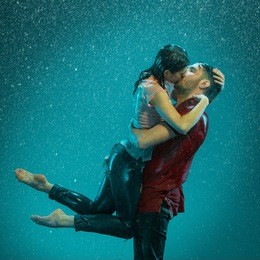 the loving couple in the rain