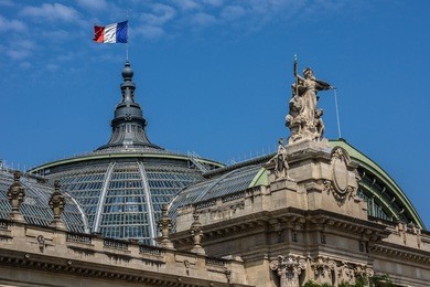 architectural details of grand palais des champs-elysees in paris, france. grand palais in beaux-arts architecture style was built for universal exposition of 1900 and made of glass, iron and steel.
