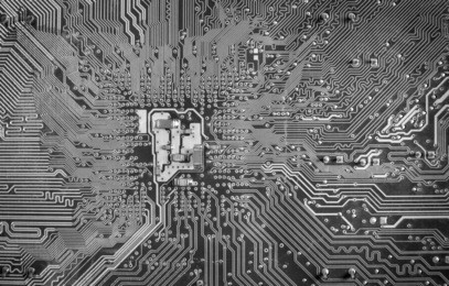 black and white closeup of circuit board traces
