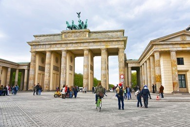 brandenburg gate in berlin in germany. the brandenburg gate is a triumphal arch, a city gate in the center of berlin. it is one of the most known sites in berlin.