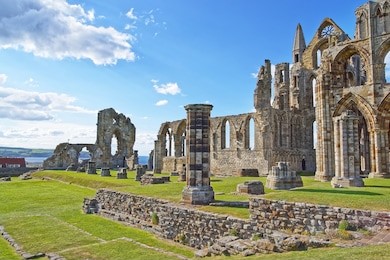 ruined entrance to whitby abbey in north yorkshire in england. it is ruins of the benedictine abbey. now it is under protection of the english heritage.