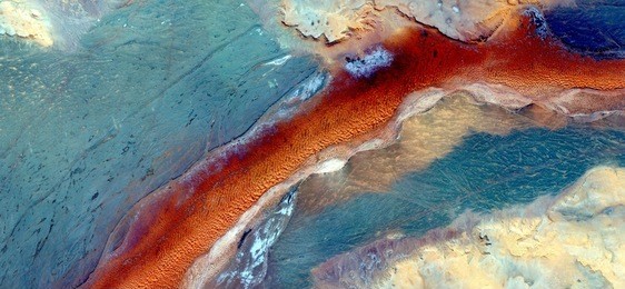 allegory, the apocalypse, fiery red cloud sailing the turquoise sky destroying everything in its path, photographs magic, just to crazy, artistic, abstract, from the deserts of africa from the air,