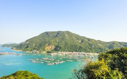 sok kwu wan bay and pier. southern part of lamma island in hong kong. view from the hill in the daytime