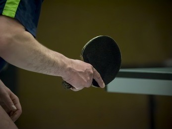 table tennis player waiting for the ball, closeup