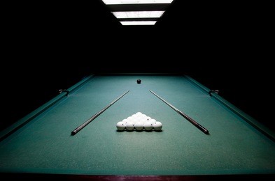 billiard balls, billiard cue  on green table