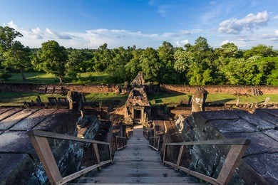 view of surrounding ancient angkor area from summit of pre rup temple in cambodia.
