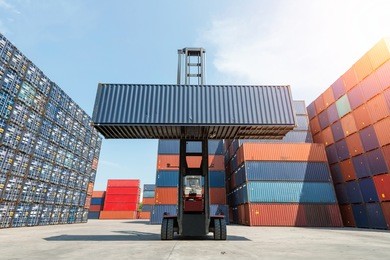 toplift handling container box loading to freight train.