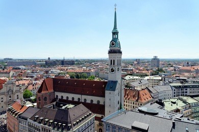 cityscape of munich, bavaria, germany seen from the top of city hall. st. peter's church, a roman catholic church, the oldest one in the district.