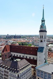 cityscape of munich, bavaria, germany seen from the top of city hall. st. peter's church, a roman catholic church, the oldest one in the district.
