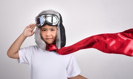 asian lovely cute boy dream to be pilot in white background