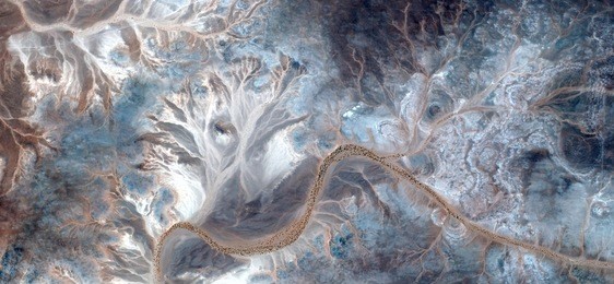 stone flowers,abstract photography of the deserts of africa from the air, bird's eye view, abstract expressionism, contemporary art, science fiction, optical illusions, 