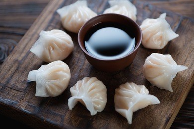 close-up of prawn hargows and a dip sauce, selective focus