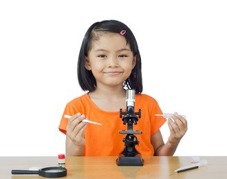 asian little girl with microscope on white background